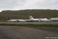 Vagar Airport 2007 with two Atlantic Airways BAe 146s, note the Grey tail and engine covers on the leased aircraft which was the colours for Faroejet before it ceased operations and Atlantic Airways took over the lease.  Photo  Paul Dubois Collection