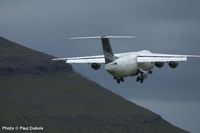 ex Faroejet BAe 146, OY-FJE now operated by Atlantic Airways taking off from Vagar Airport. Shows the difficult operating conditions faced by the crew.  Photo © Paul Dubois Collection